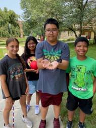 kids with a frog
